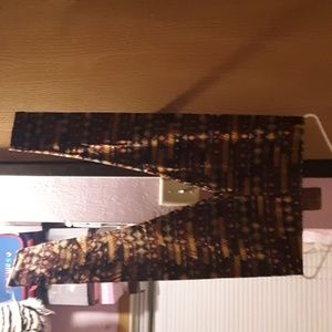 Pants with designs and it's brown.